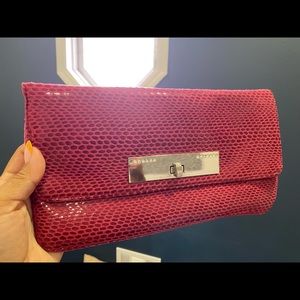 Hot pink clutch